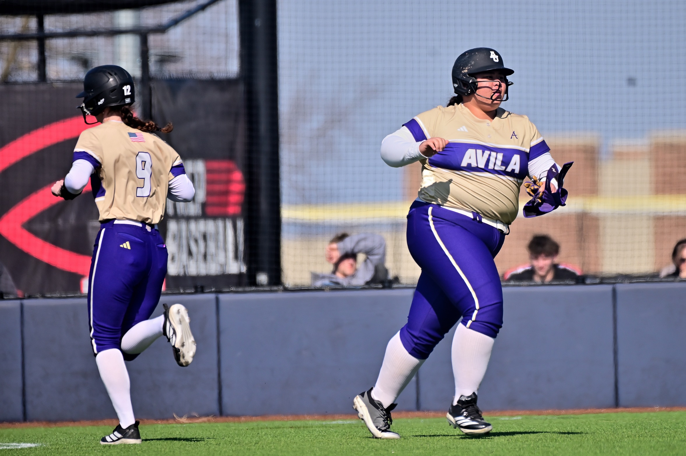 SOFTBALL SPLITS WITH NO. 14 EVANGEL